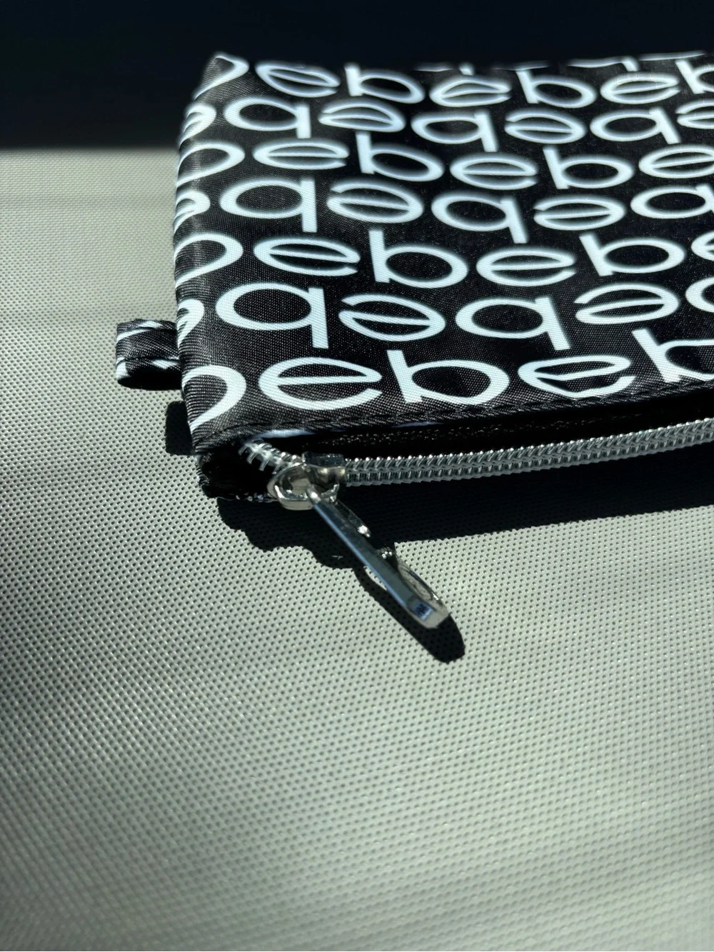 Bebe Black and White Logo Pouch